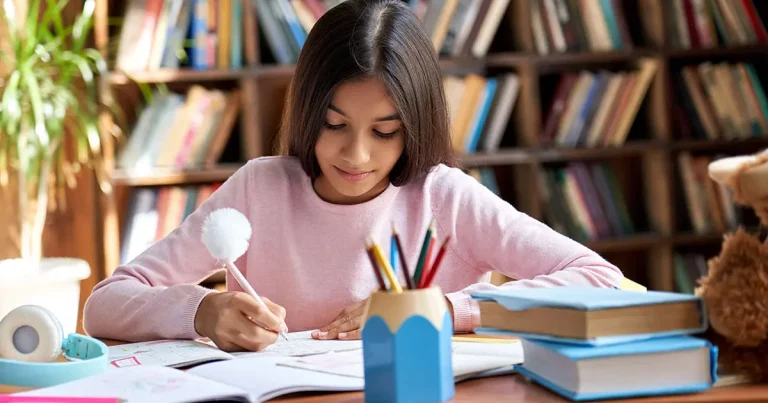 Blog 3 Girl studying in the library for 11 plus
